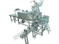 Оборудование для групповой упаковки флаконов с канифолью в пленку